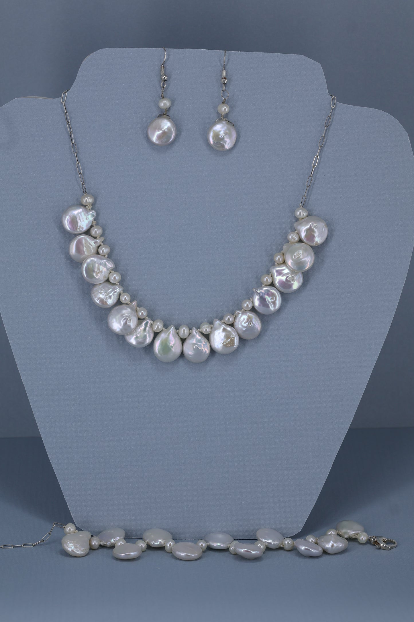 Fresh water pearl sterling silver .925 necklace paired with matching earrings and bracelet.  Necklace – 16” or 41cm  Bracelet -7” or 19 cm