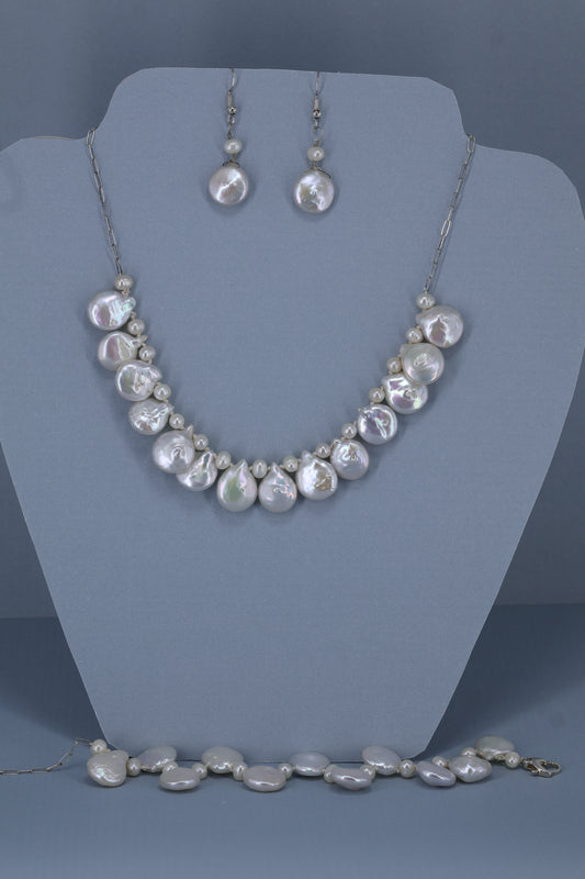 Fresh water pearl sterling silver .925 necklace paired with matching earrings and bracelet.  Necklace – 16” or 41cm  Bracelet -7” or 19 cm