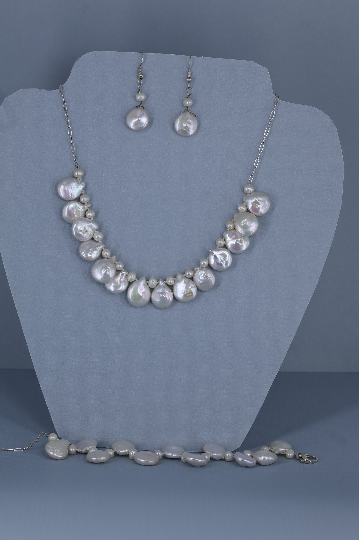 Fresh water pearl sterling silver .925 necklace paired with matching earrings and bracelet.  Necklace – 16” or 41cm  Bracelet -7” or 19 cm
