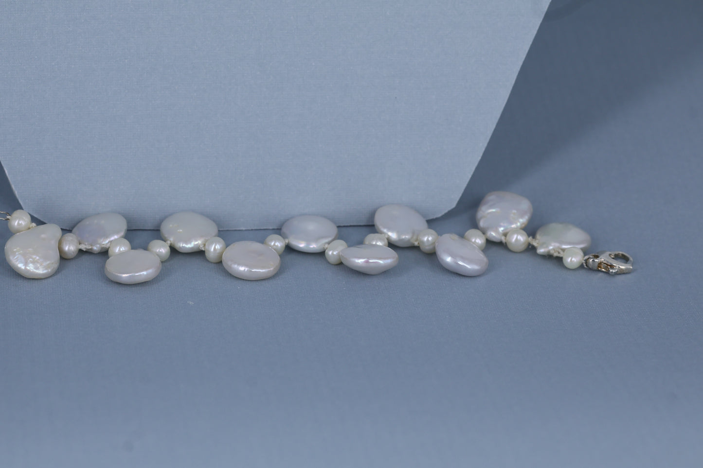 Fresh water pearl sterling silver .925 necklace paired with matching earrings and bracelet.  Necklace – 16” or 41cm  Bracelet -7” or 19 cm