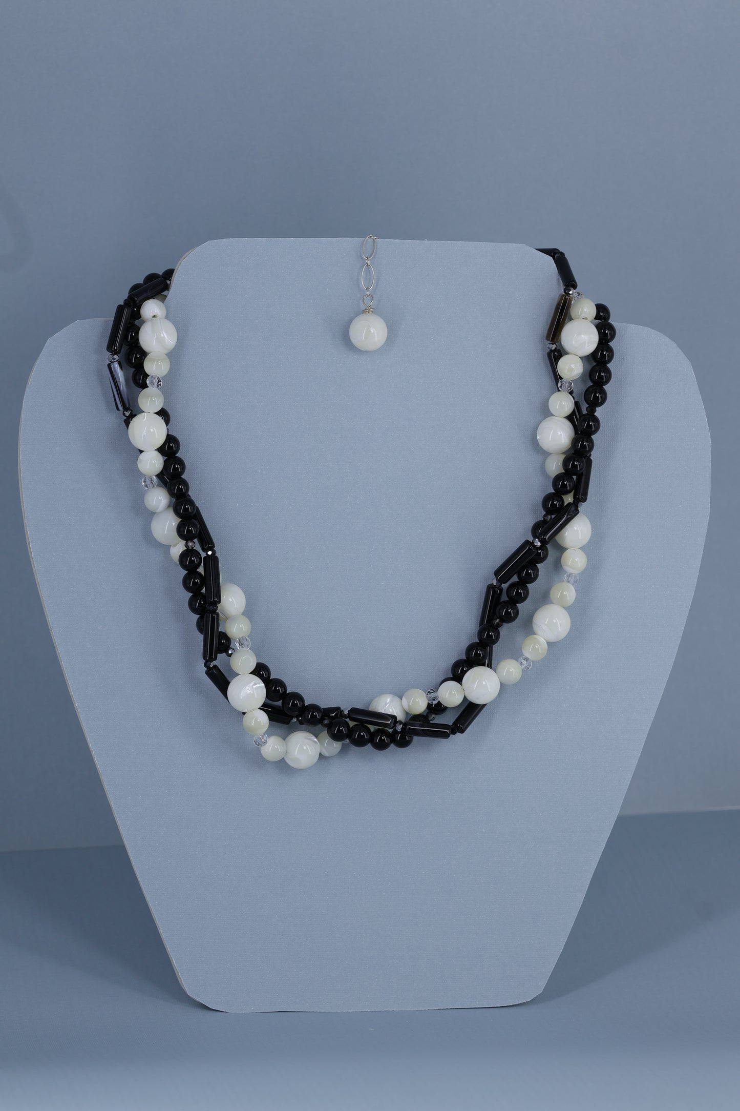 Mother of pearl, onix,agate and sterling silver