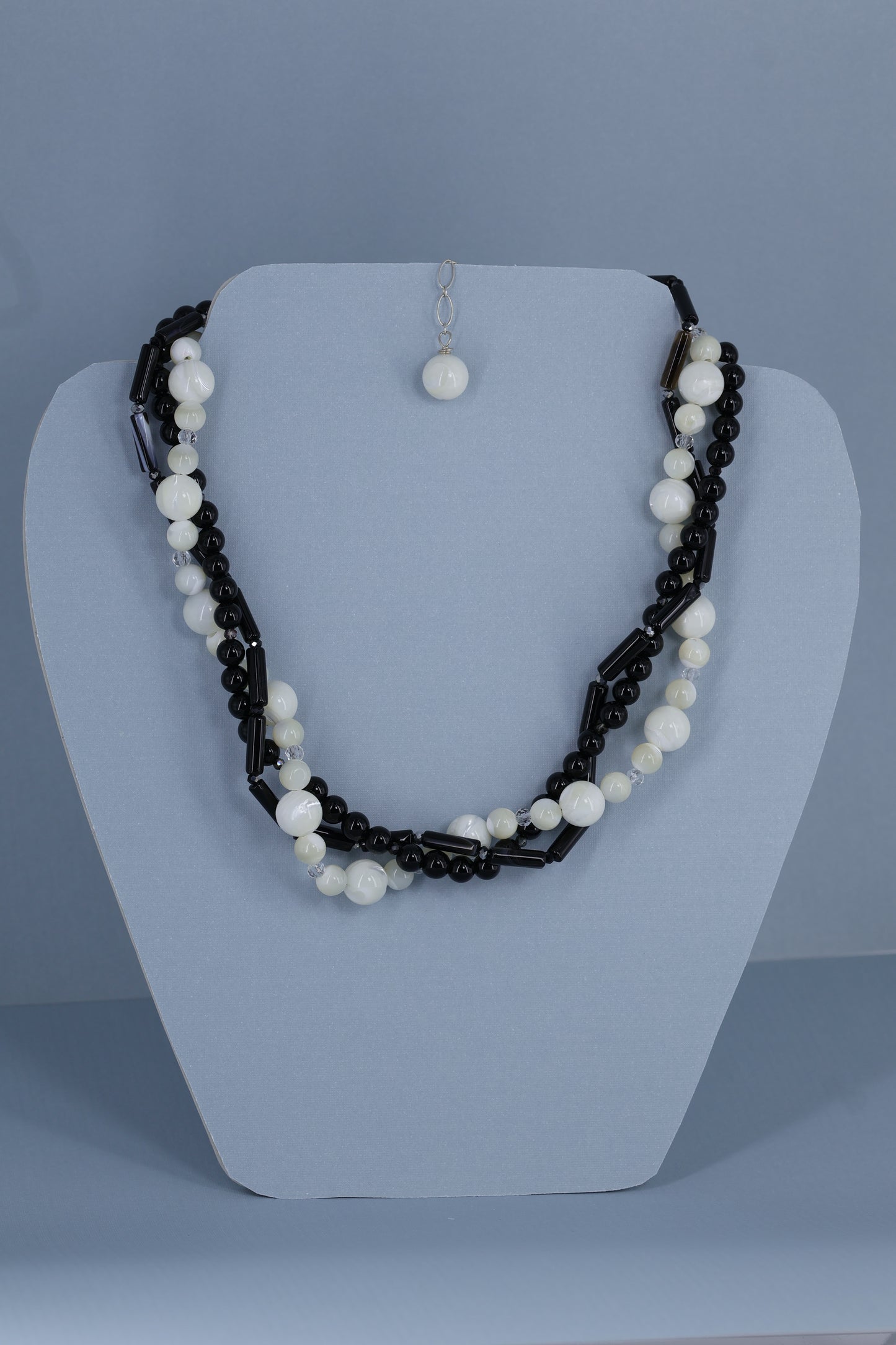 Mother of pearl, onix,agate and sterling silver