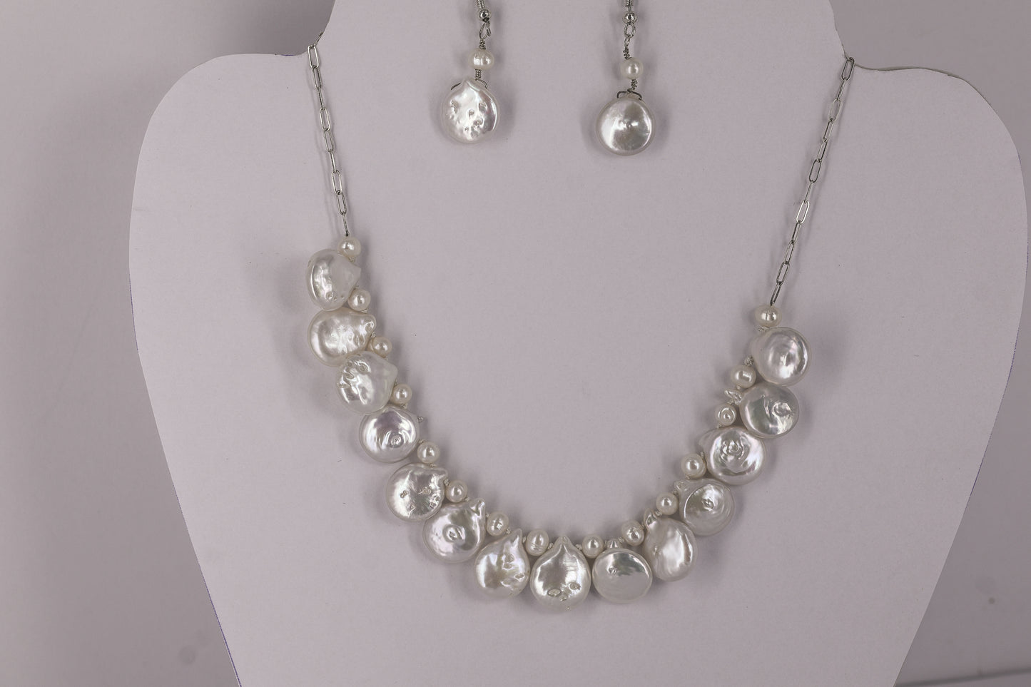 Fresh water pearl sterling silver .925 necklace paired with matching earrings and bracelet.  Necklace – 16” or 41cm  Bracelet -7” or 19 cm