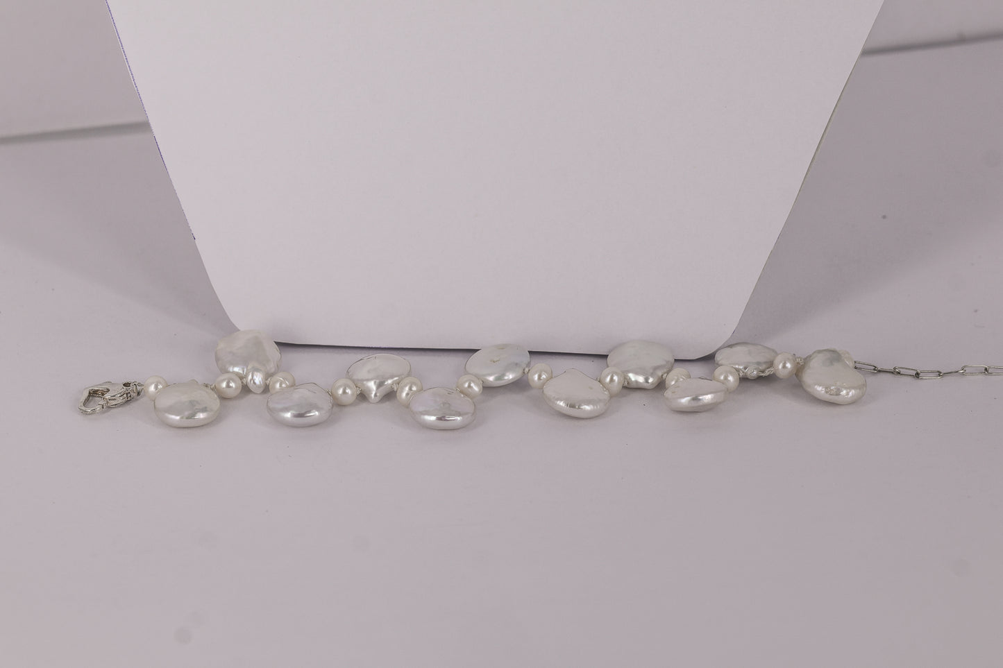 Fresh water pearl sterling silver .925 necklace paired with matching earrings and bracelet.  Necklace – 16” or 41cm  Bracelet -7” or 19 cm
