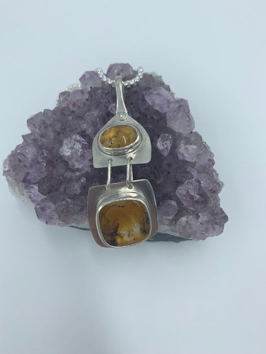 Amber set in sterling silver .925 (Pendant only)  28.09mm x 73.65mm