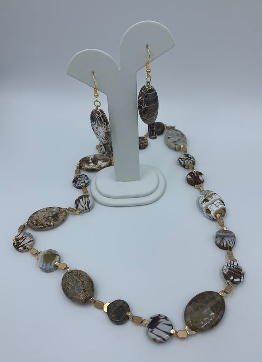 Amber crackled Agate oval beads and gold hematite gold-plated necklace paired with matching earrings.  25” or 28cm