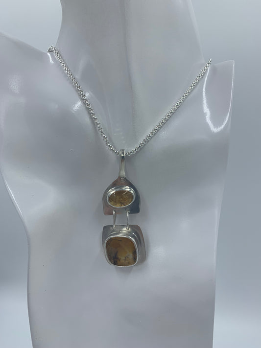 Amber set in sterling silver .925 (Pendant only)  28.09mm x 73.65mm