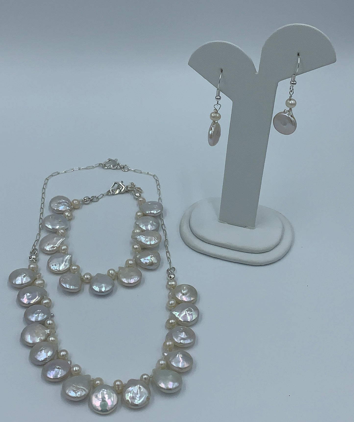 Fresh water pearl sterling silver .925 necklace paired with matching earrings and bracelet.  Necklace – 16” or 41cm  Bracelet -7” or 19 cm