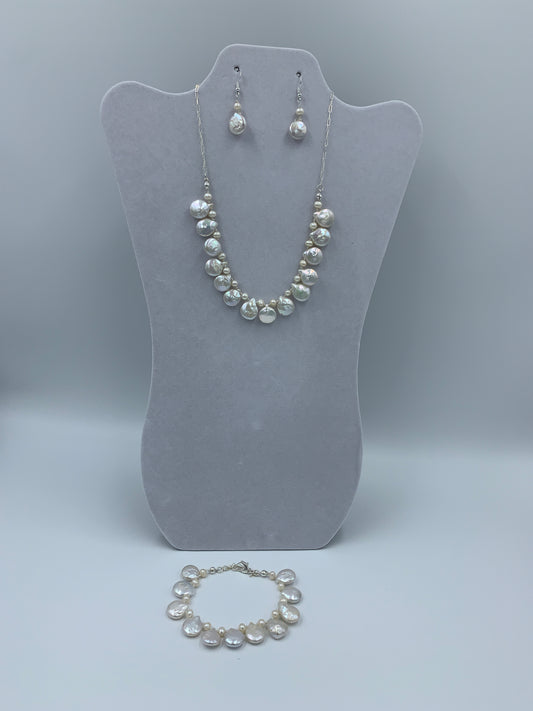 Fresh water pearl sterling silver .925 necklace paired with matching earrings and bracelet.  Necklace – 16” or 41cm  Bracelet -7” or 19 cm