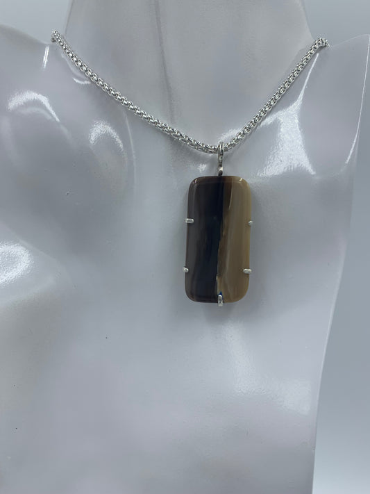 Petrified wood stone set in sterling silver (Pendant only)  21.29mm x 42.43mm